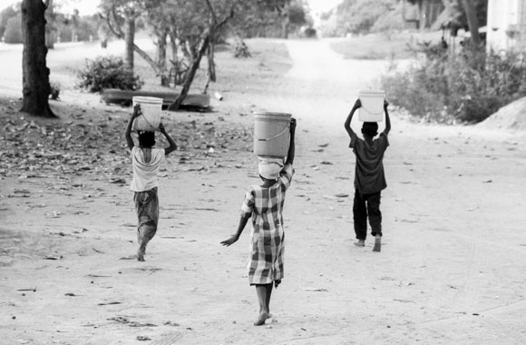Kids Carrying Water